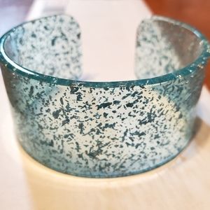 Paparazzi light aqua plastic cuff.